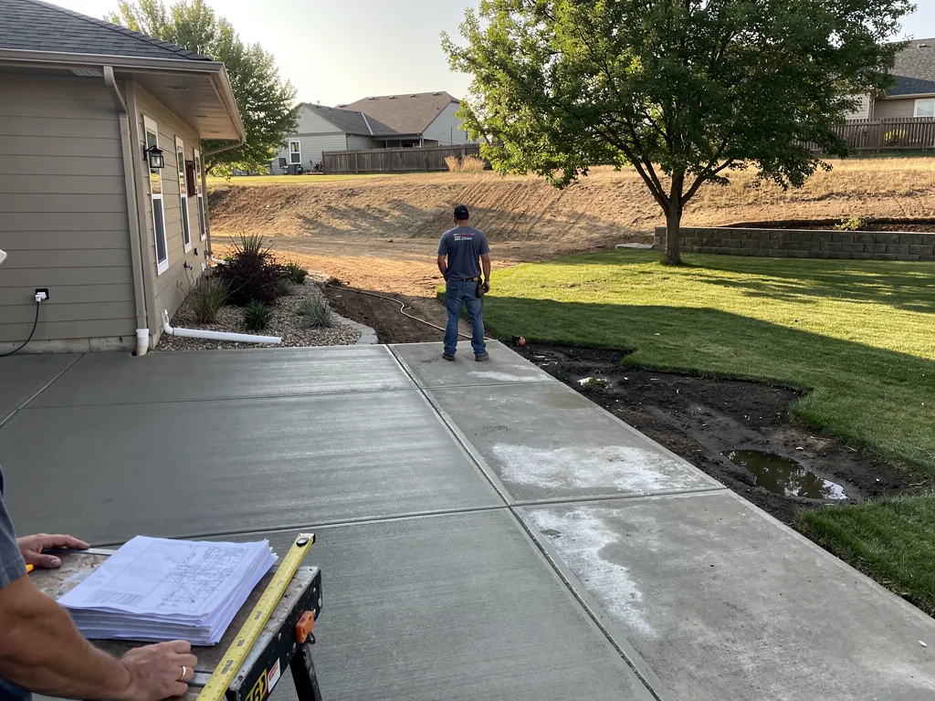 Freshly graded and compacted base ready for concrete patio pour