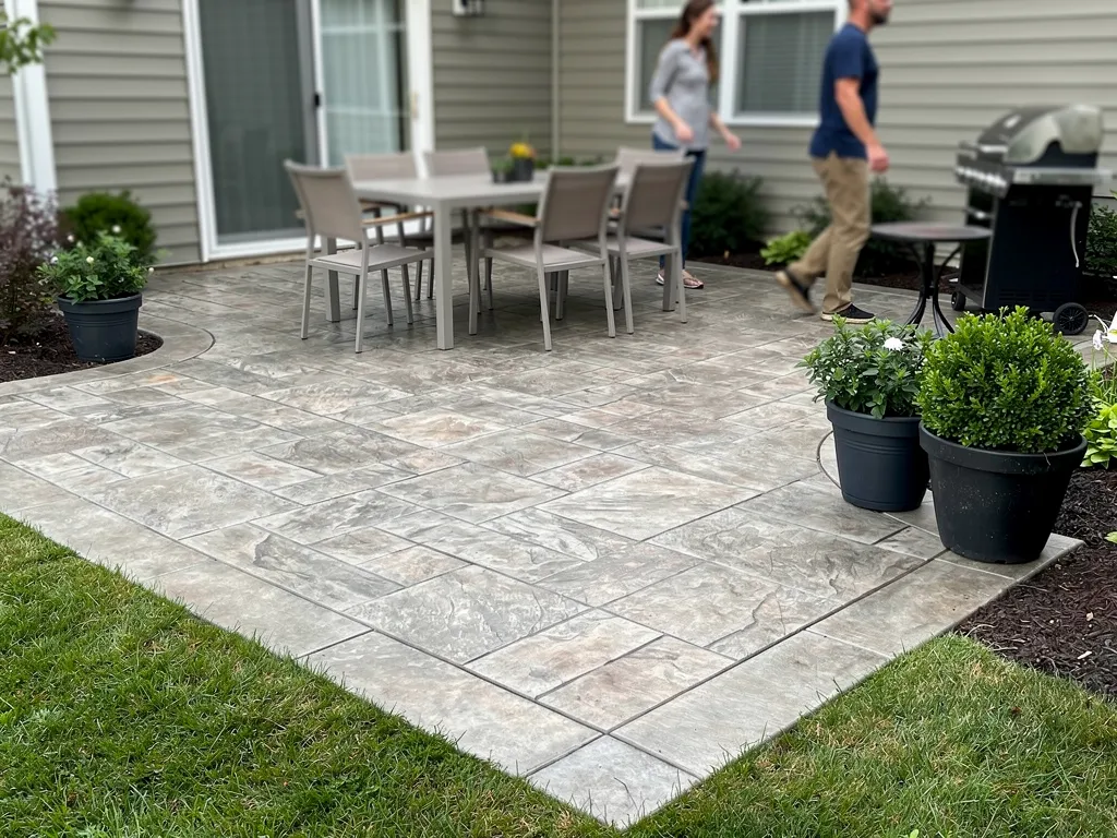 Textured stamped concrete patio resembling natural stone